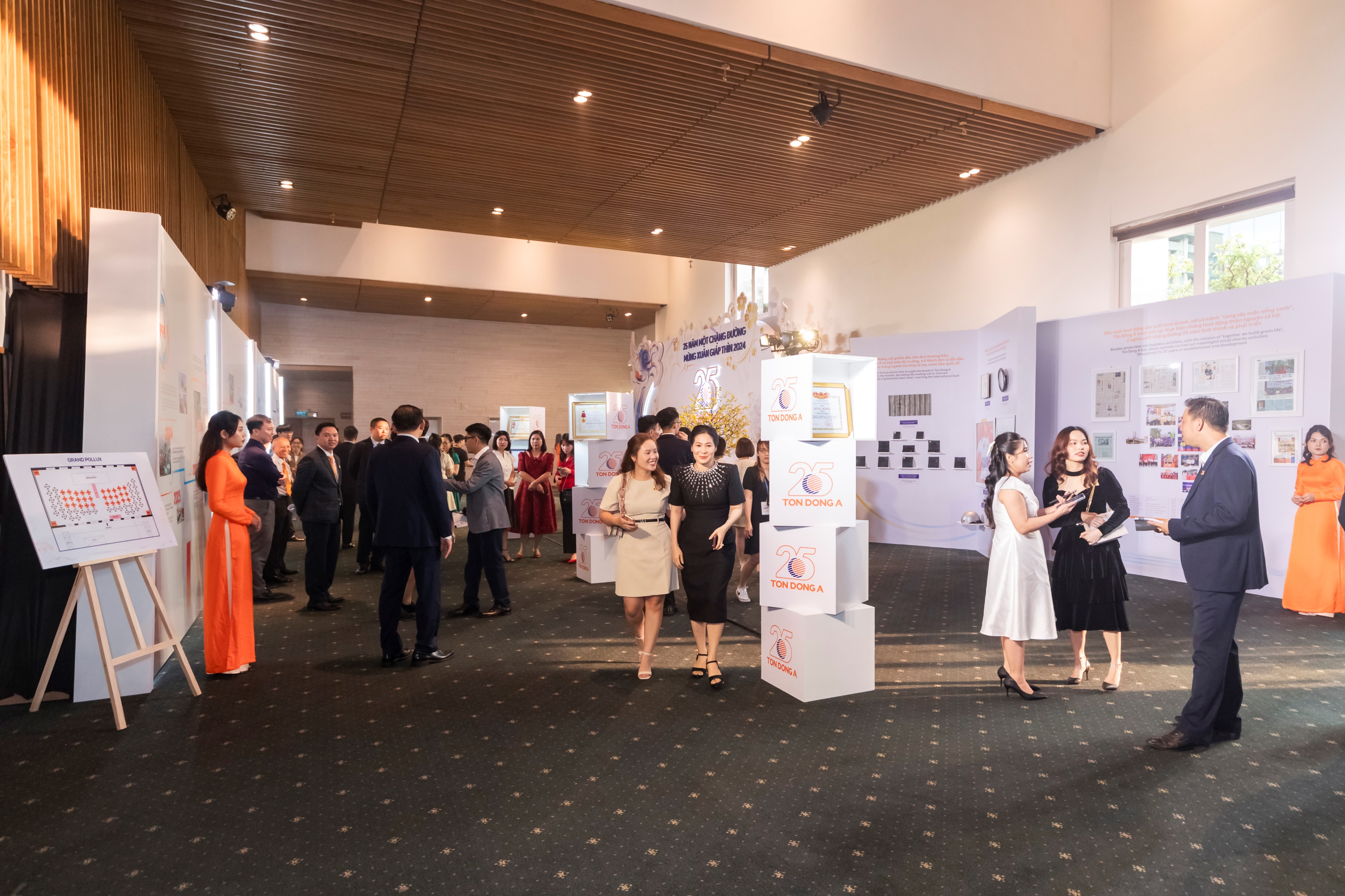 Guests explore the brand’s 25-year journey exhibition.